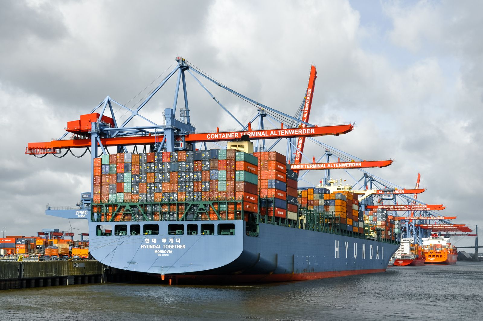 Container ship docked at a European freight port